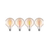 Four large light bulbs with colored spiral filaments in yellow, red, green, and orange for decorative lighting