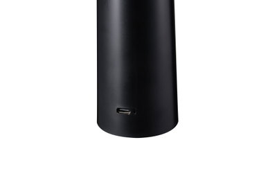 Black cylindrical device with USB-C port, modern electronic accessory