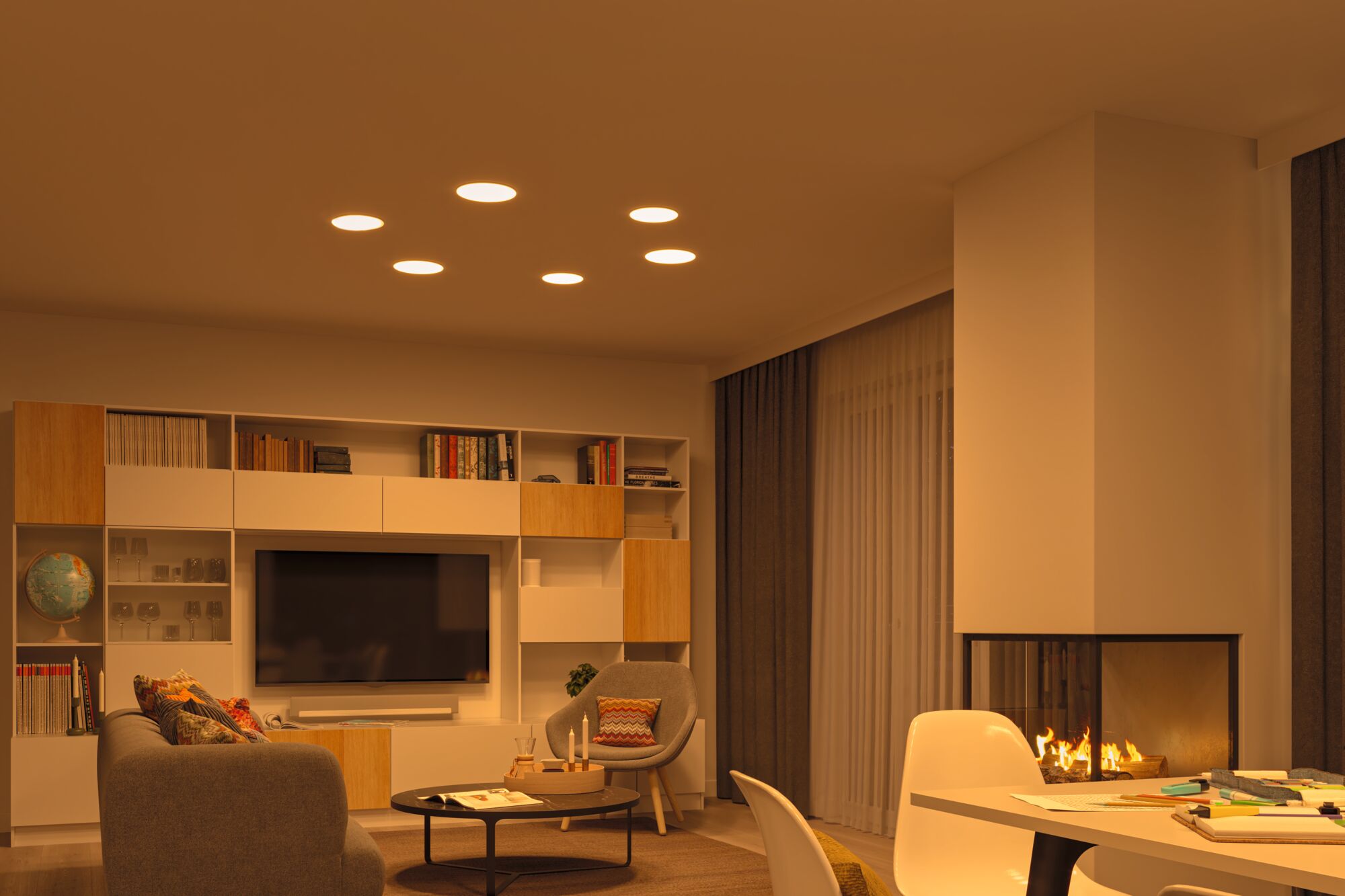 Living room with modern ceiling lights, fireplace, and wood-gray furniture creating a cozy ambiance