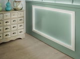 White LED frame light on green wall with wooden cabinet and decor in modern living space