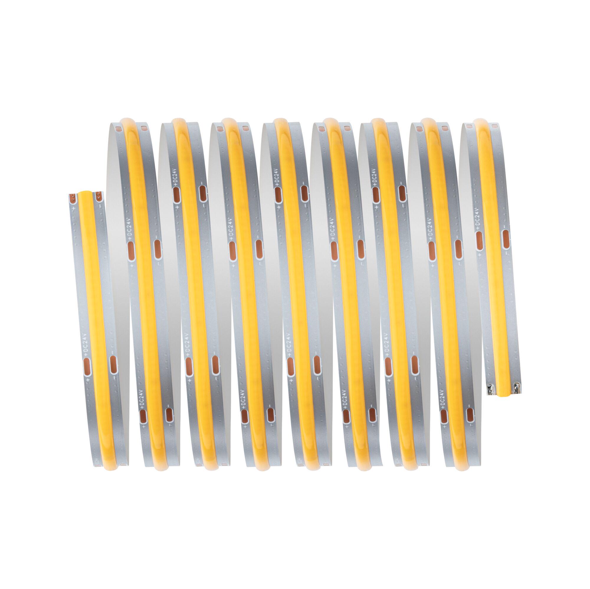 Flexible LED strip with warm white light and silver base for versatile lighting applications
