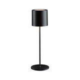 Black metal table lamp with round base and cylindrical shade for modern indoor lighting