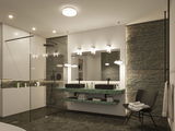 Salle de bain moderne avec plan vasque en marbre vert, lavabos noirs et éclairage LED indirect