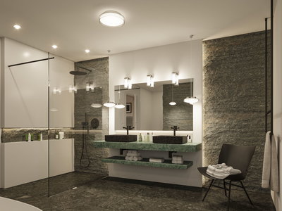 Salle de bain moderne avec plan vasque en marbre vert, lavabos noirs et éclairage LED indirect