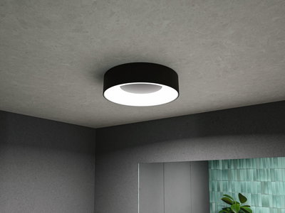 Round black ceiling light with white diffuser, modern LED indoor lighting for living rooms.