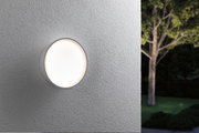 Runde weiße LED-Außenwandleuchte an grauer Wand mit weichem Licht für Gartenbeleuchtung
