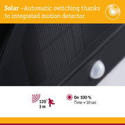 Close-up of black solar panel with integrated motion detector for automatic light switching