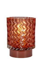 Orange glass table lamp with zigzag pattern and brown base for ambient lighting in interiors