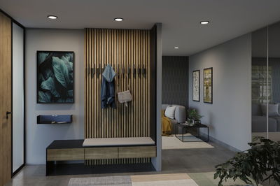 Modern hallway with wooden panel, bench and coat rack in natural wood tone and black accents.