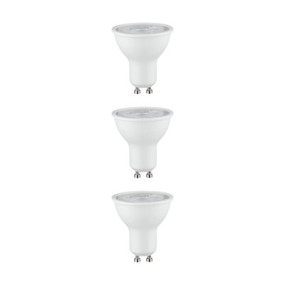 Three white GU10 LED bulbs with clear glass, energy-saving LED spotlights for indoor lighting