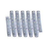Flexible LED strip light with white LEDs and adhesive backing for versatile lighting solutions.