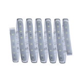 Flexible LED strip light with white LEDs and adhesive backing for versatile lighting solutions.