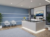 Bureau moderne avec comptoir d'accueil blanc, mur bleu avec bandes lumineuses LED et deux chaises blanches