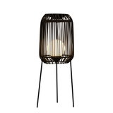 Standing lamp with black metal frame and white globe light for modern interior lighting