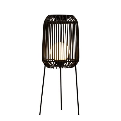 Standing lamp with black metal frame and white globe light for modern interior lighting