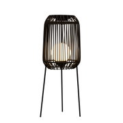 Standing lamp with black metal frame and round warm white LED bulb for indoor lighting