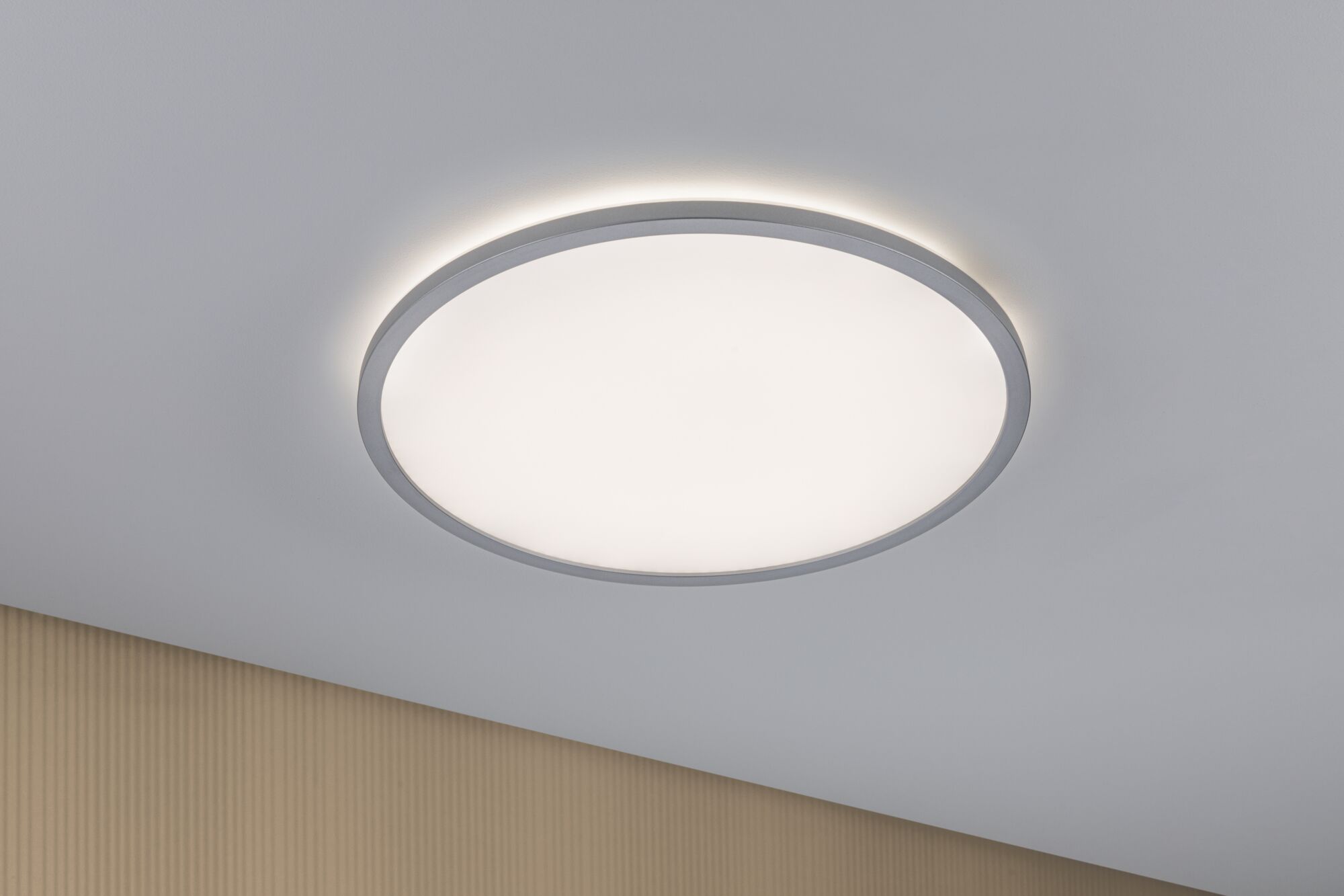 Round ceiling light with white diffuser and grey metal frame for modern room lighting