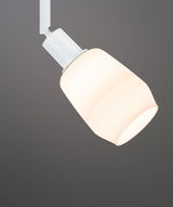 Moderner weißer LED-Strahler mit milchigem Glas, ideal für Akzentbeleuchtung im Wohnraum