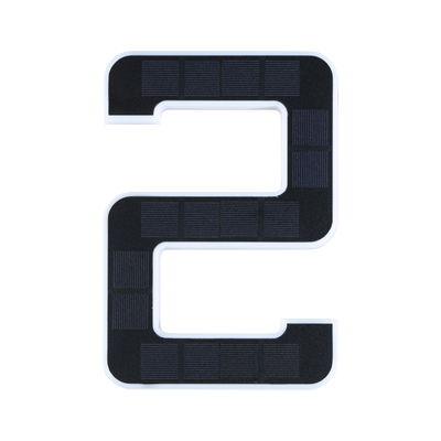 Black solar panel shaped as number 2 with white frame for sustainable energy use