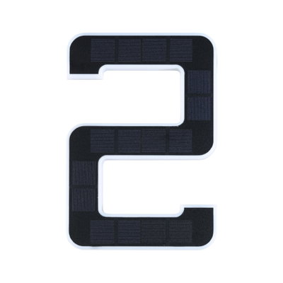Black solar panel shaped as number 2 with white frame for sustainable energy use