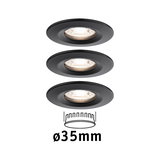 Three black metal recessed spotlights with 35 mm diameter for modern LED lighting