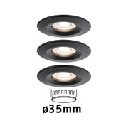 Three black metal recessed spotlights with 35 mm diameter for modern LED lighting