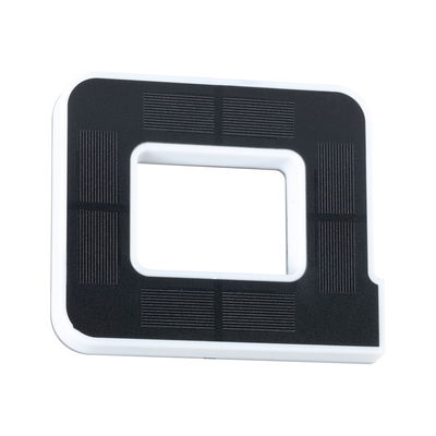 Rectangular black and white plastic frame with central cutout for LED lighting fixture