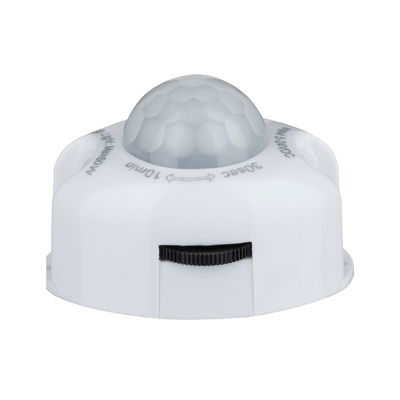 White plastic motion sensor with dome lens and adjustment dial for light control
