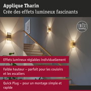 Applique Tharin dorée avec effets lumineux réglables, parfaite pour couloirs et escaliers