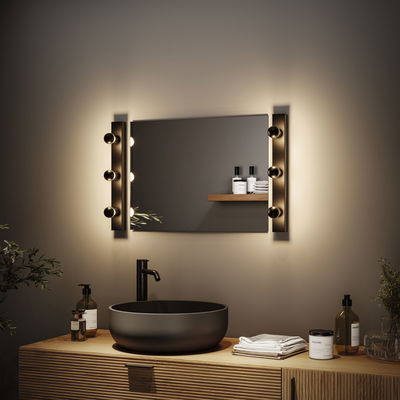Modern bathroom with black ceramic sink and warm white LED wall lights on both sides of the mirror.