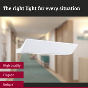 White modern LED ceiling spotlight made of plastic in hallway with high-quality elegant lighting