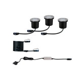 Trois projecteurs LED noirs avec bord en acier inoxydable, câbles et alimentation pour éclairage extérieur.