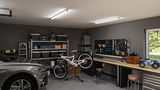 Bright LED ceiling lights in modern garage with workbench, bike and car, practical workshop lighting