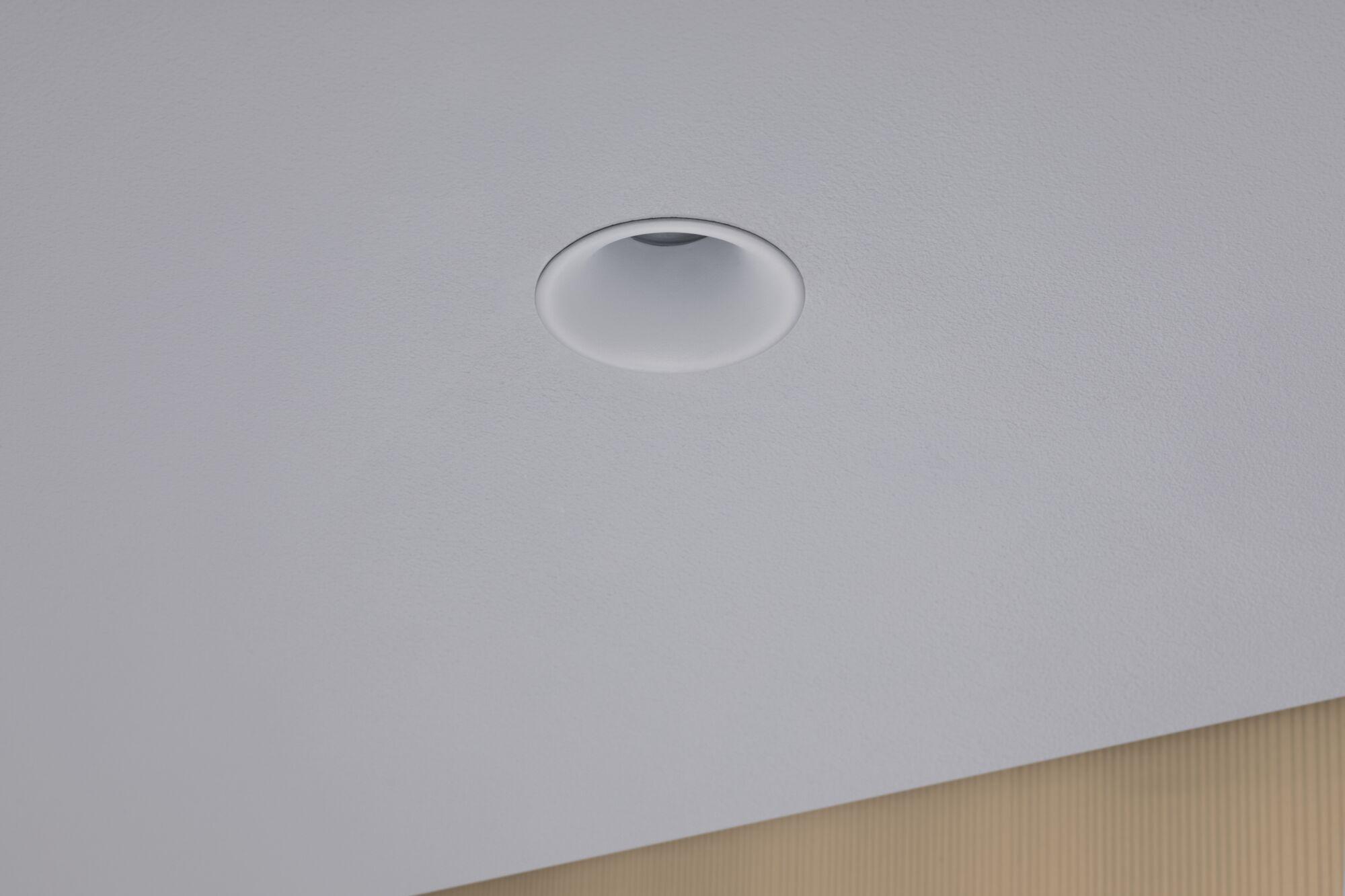 White recessed plastic spotlight integrated in ceiling for modern LED lighting solution