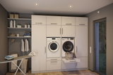 Modern white built-in laundry room with washing machine, dryer, and integrated ironing board in light wood space.
