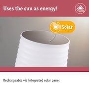 White solar-powered container with integrated solar panel for sustainable energy use.