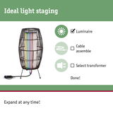 Modern floor lamp with black metal frame and colorful light, perfect for home lighting design.