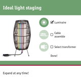 Modern floor lamp with black metal frame and colorful light, perfect for home lighting design.