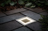 Recessed square LED floor light in stainless steel with honeycomb pattern and warm white outdoor lighting
