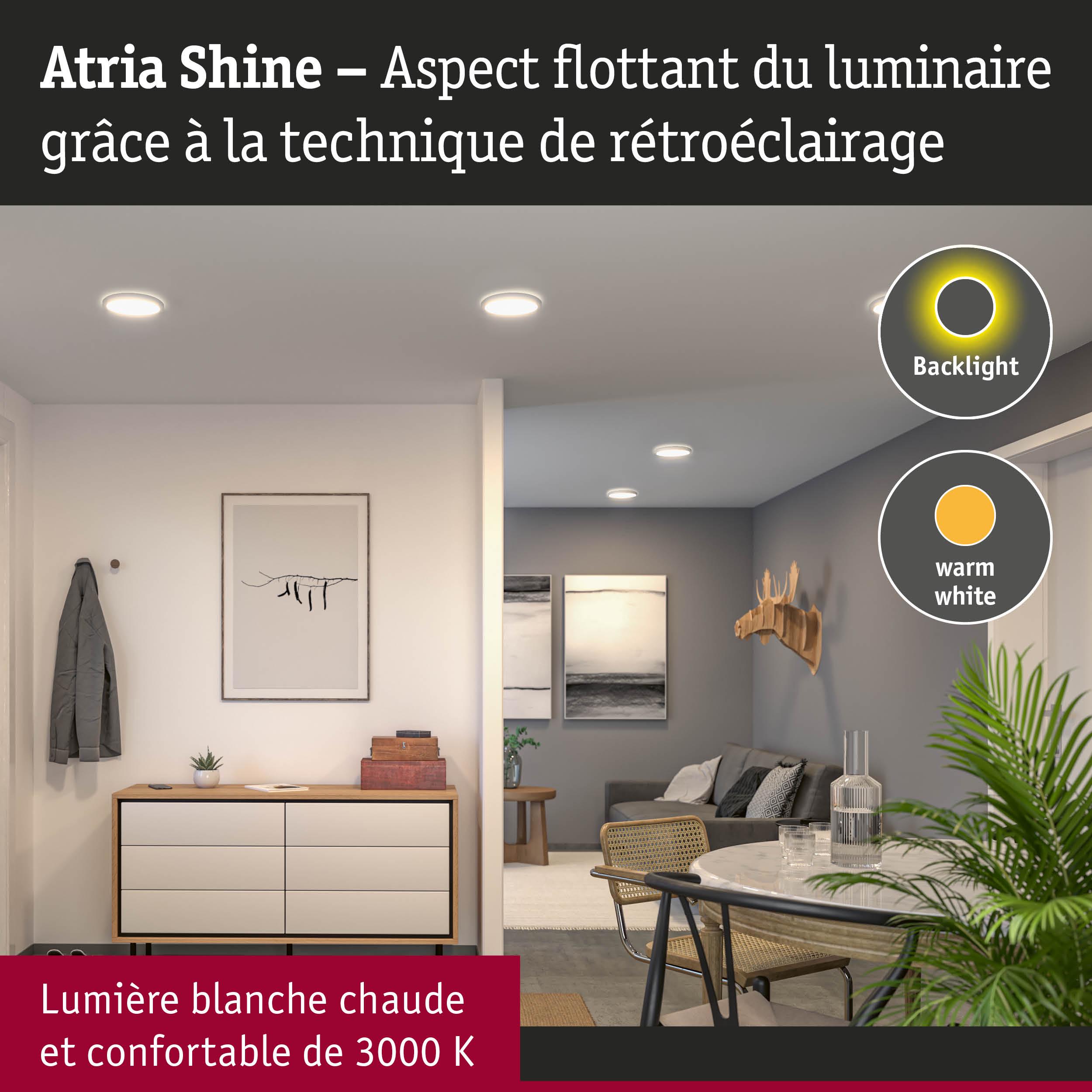 Salon avec luminaires LED Atria Shine en lumière blanche chaude et rétroéclairage pour ambiance chaleureuse