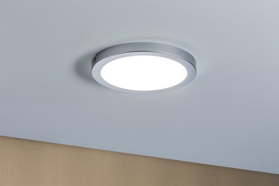 Round LED ceiling light with white diffuser and silver metal frame for modern room lighting