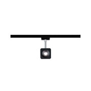 Schwarzer quadratischer LED-Strahler aus Metall an schwarzer Schiene für moderne Innenbeleuchtung