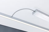 Modern LED ceiling light with silver aluminum housing and flexible connection cable for living spaces.