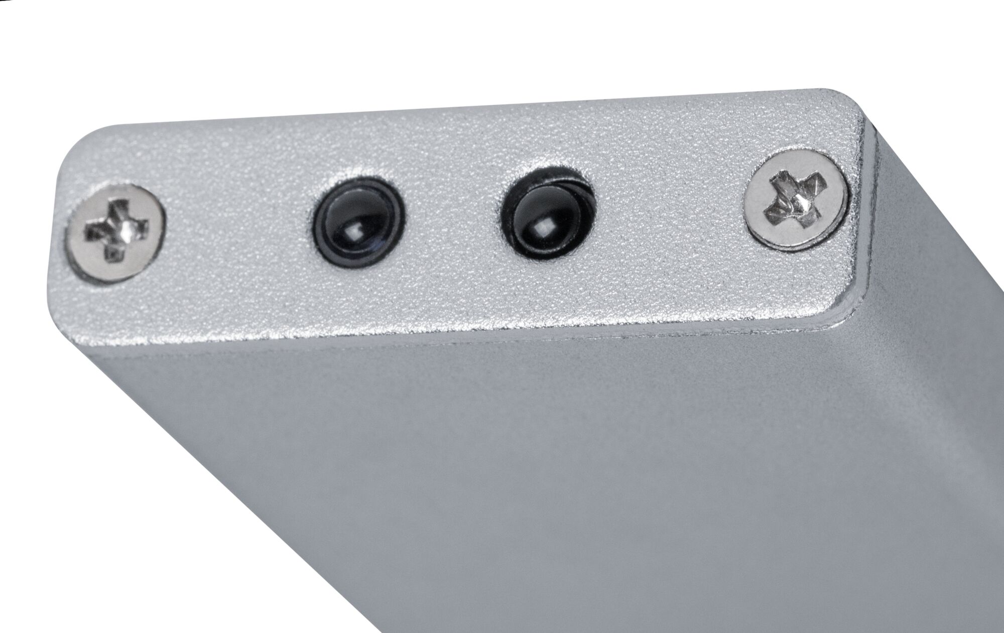 Close-up of silver metal housing with two black sensors and screws for lighting technology