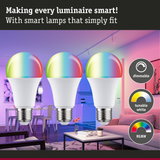 Three dimmable RGBW LED bulbs with white base in modern living room featuring colorful smart lighting