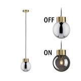 Modern pendant light with brass metal and smoky glass, shown off and on for lighting decor.
