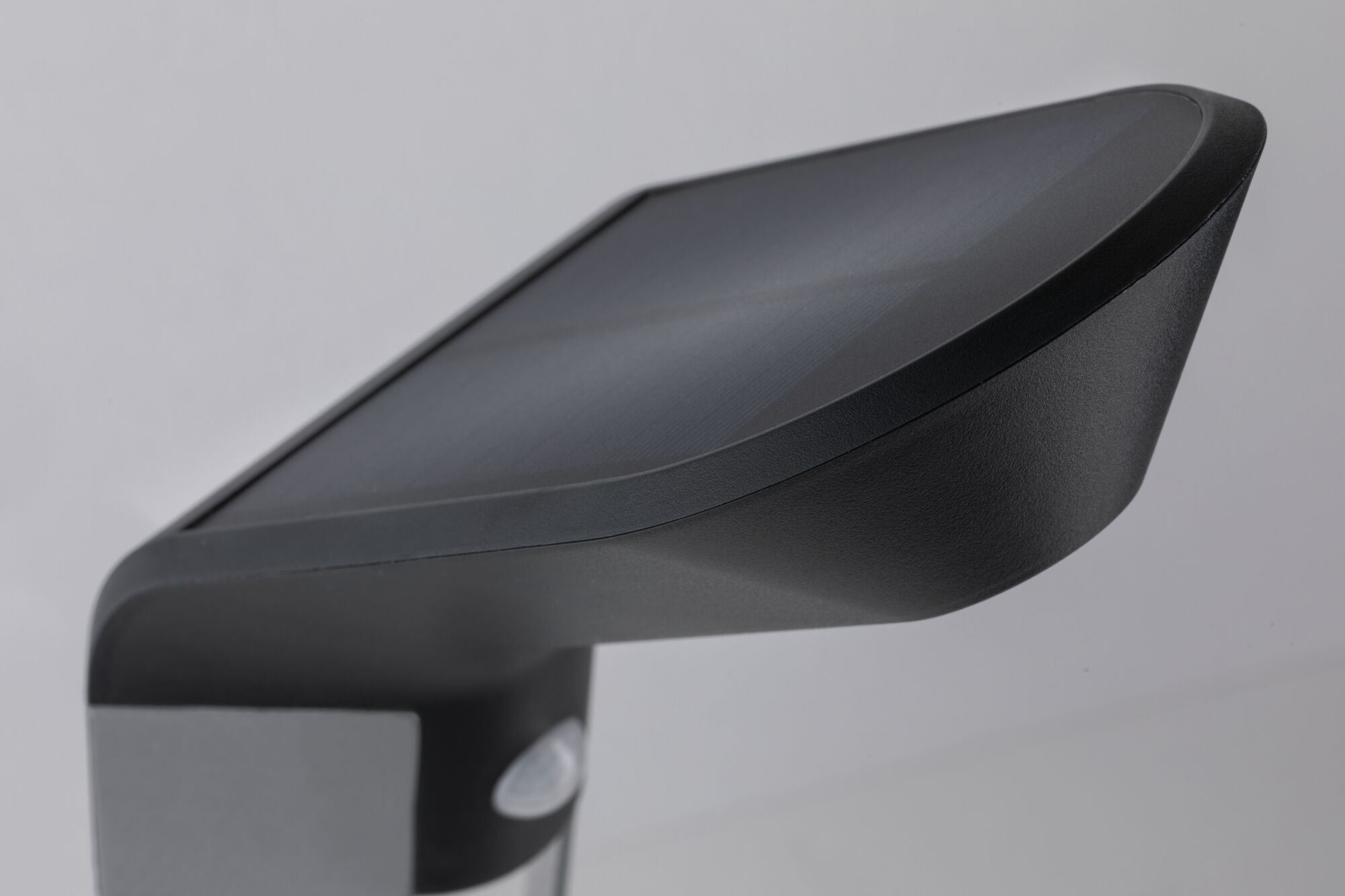 Applique extérieure noire en plastique avec détecteur de mouvement, design moderne pour jardin.