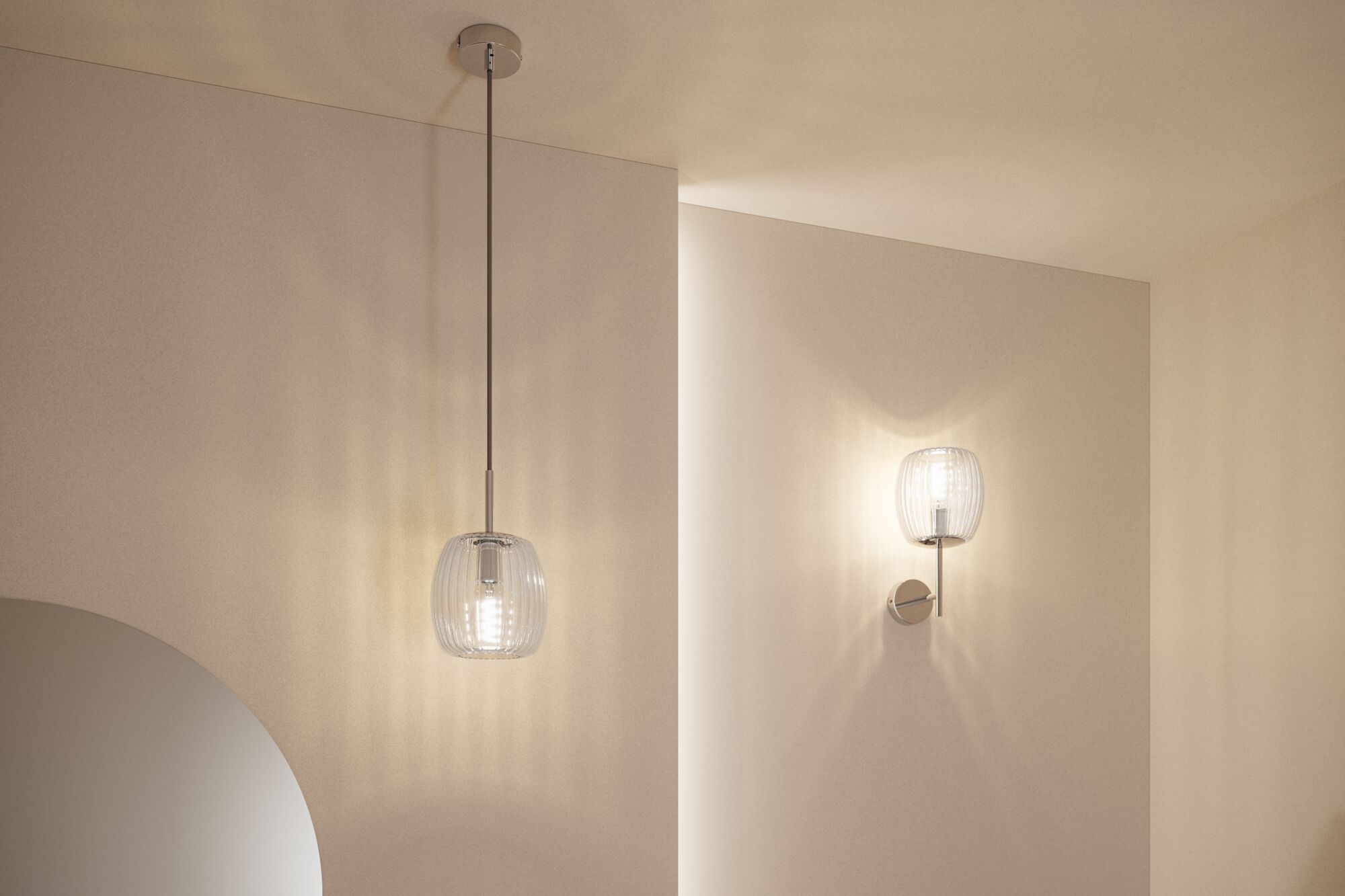 Modern pendant and wall light with clear glass and silver metal for ambient lighting in living spaces