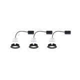Three black recessed frames with white LED modules and cables for modern LED downlights.