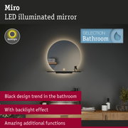 Round LED illuminated bathroom mirror with black design and backlight effect for modern bathroom decor